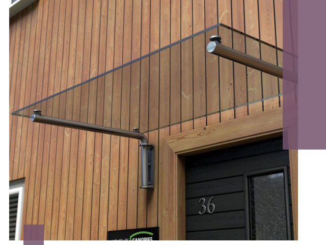 Стеклянные козырьки на входы и фасады в Усинске